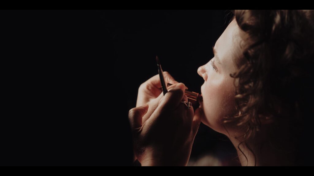 A bride getting ready in the morning rooms at Prestwold Hall