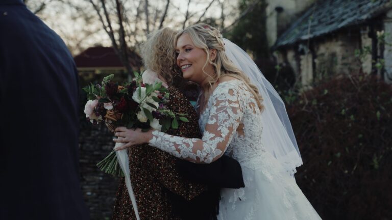 A natural, unposed moment between a bride and her guests
